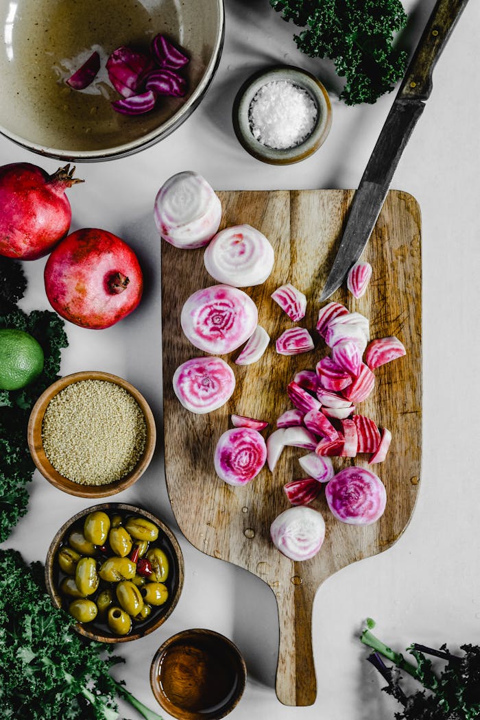 The Art of Drawing Readers In: Your attractive post title goes here Top view of beetroot and ingredients on a chopping board for a vibrant food preparation scene.